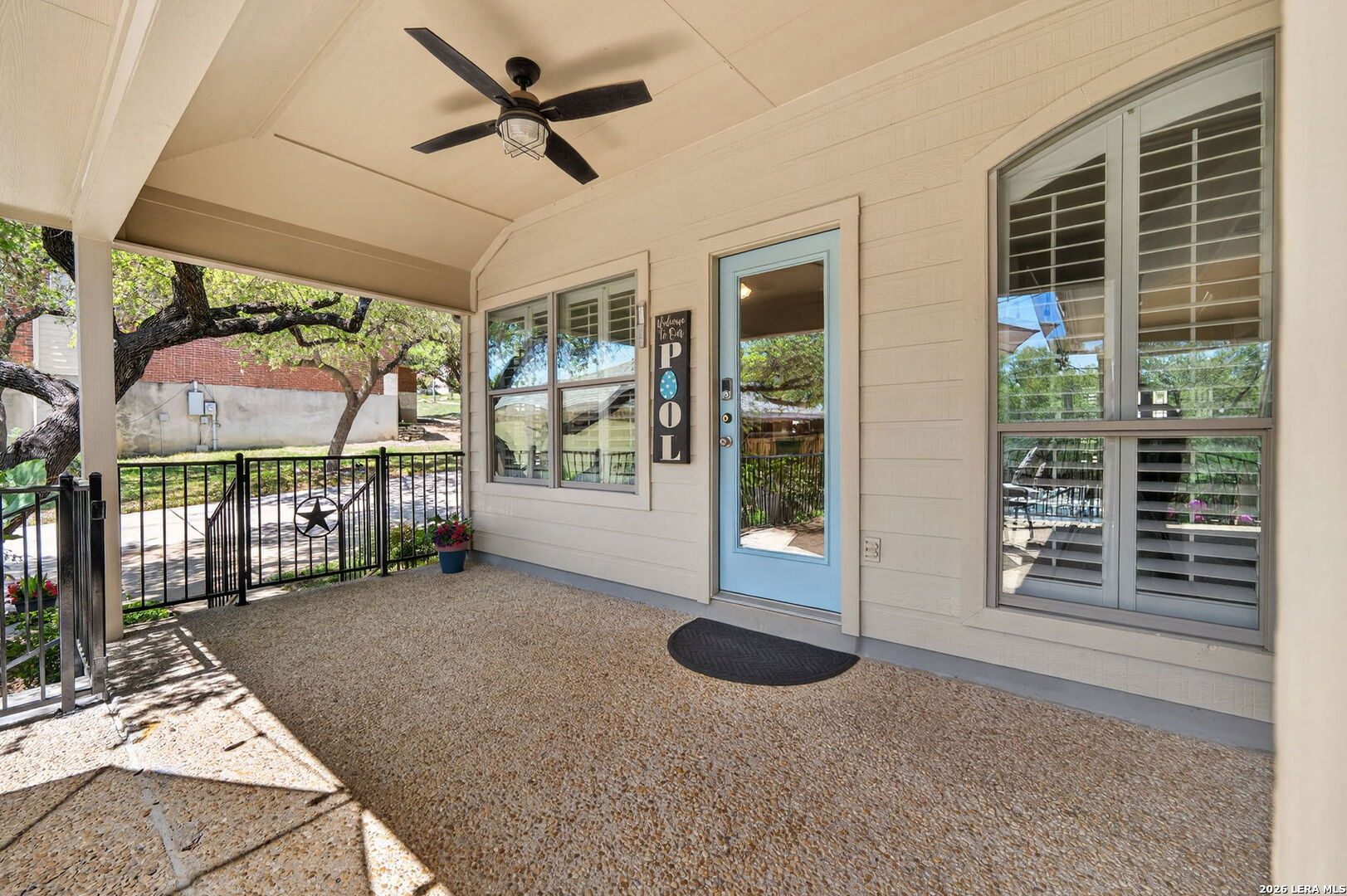 9514 Potters Point Helotes, TX 78023 - Photo 28 of 37 a view of a livingroom with a furniture and floor to ceiling window