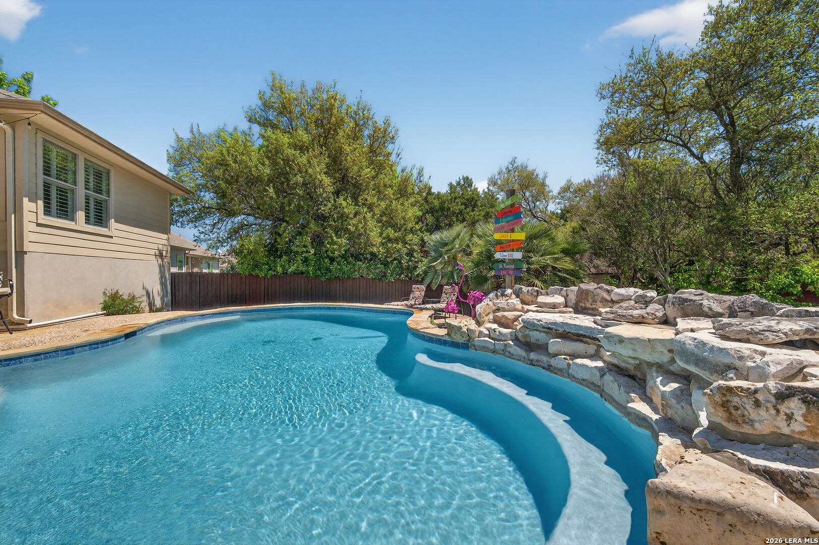 9514 Potters Point Helotes, TX 78023 - Photo 32 of 37 a view of a backyard with swimming pool