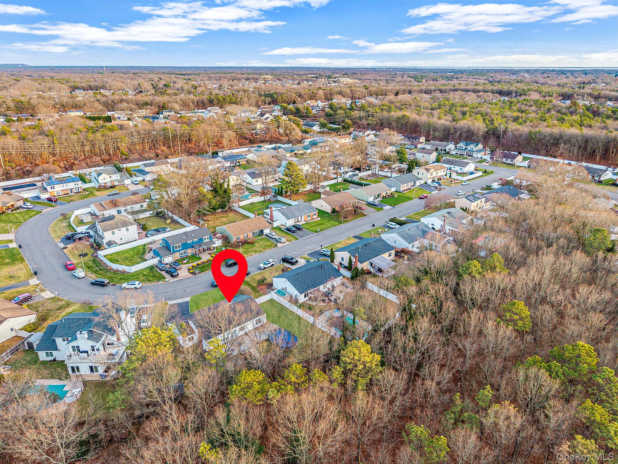 32 San Rafael Avenue Holbrook, NY 11741 - Photo 12 of 44 an aerial view of residential houses with outdoor space