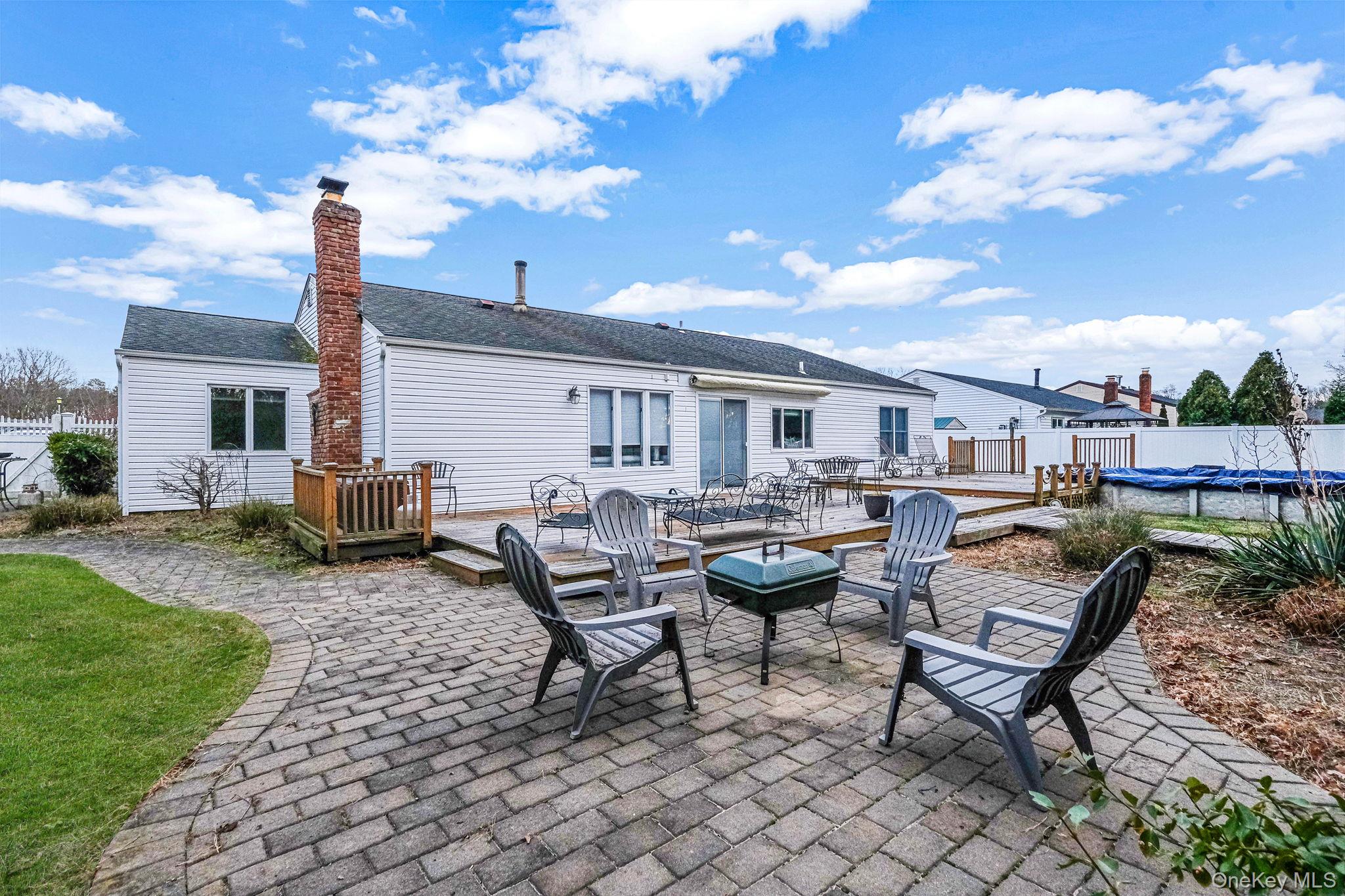 32 San Rafael Avenue Holbrook, NY 11741 - Photo 18 of 44 a view of a terrace with sitting area