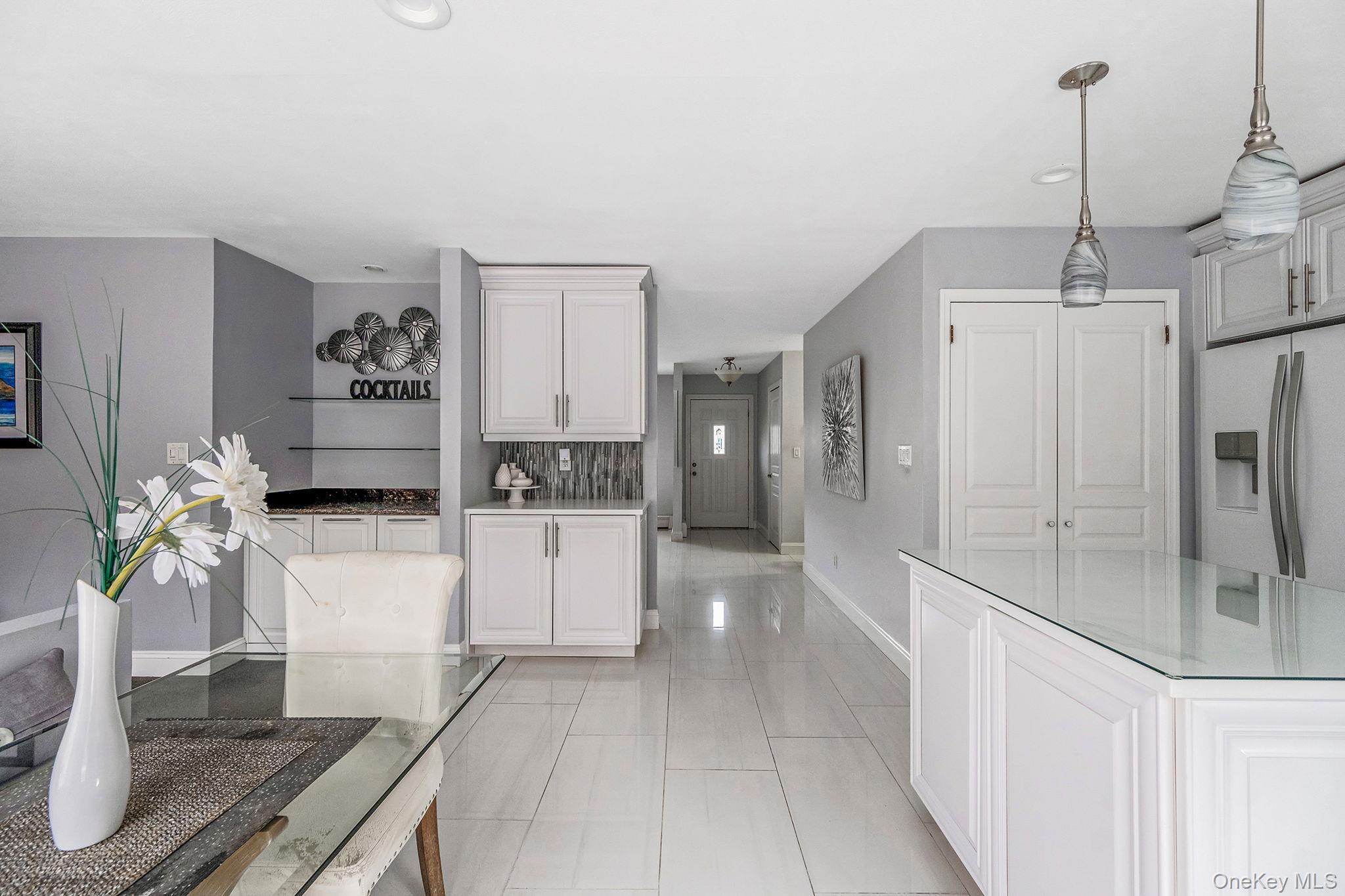 32 San Rafael Avenue Holbrook, NY 11741 - Photo 25 of 44 a view of a kitchen with refrigerator and stove
