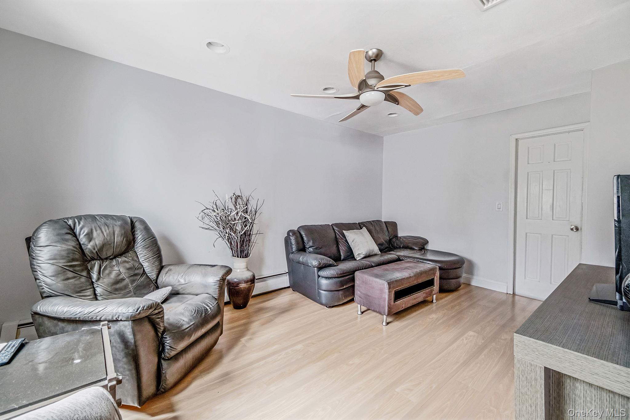 32 San Rafael Avenue Holbrook, NY 11741 - Photo 31 of 44 a living room with furniture