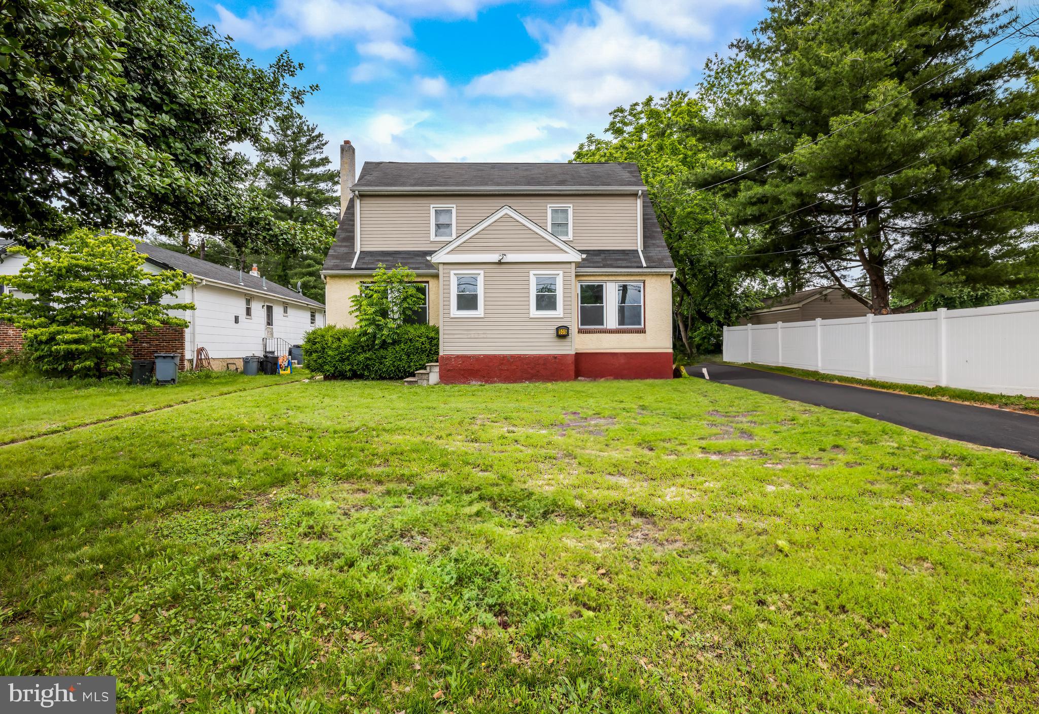 505 West Evesham Road, Unit A Glendora, NJ 08029 - Photo 11 of 11 a view of a house with a yard and sitting area