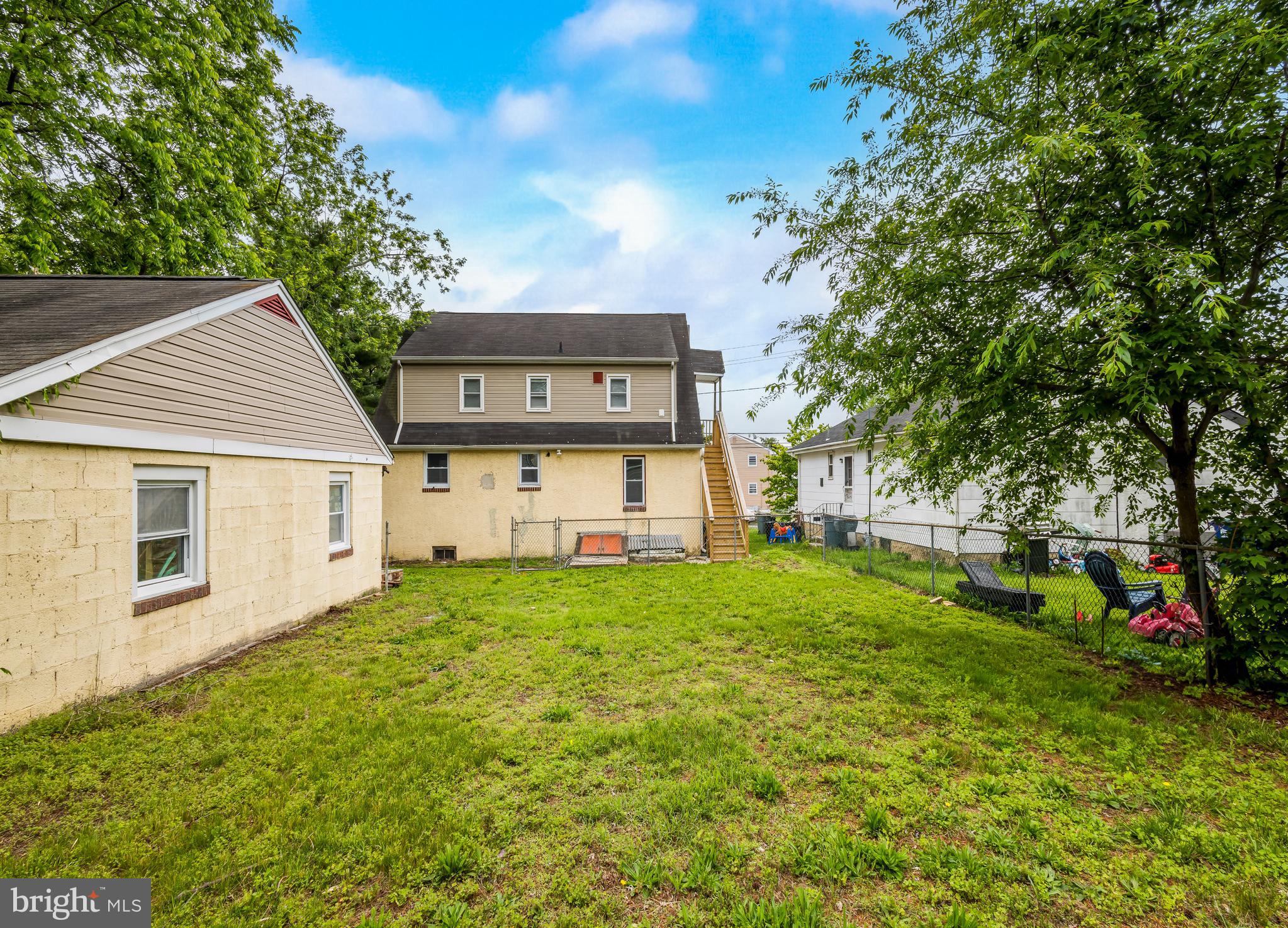 505 West Evesham Road, Unit A Glendora, NJ 08029 - Photo 10 of 11 a view of a house with a big yard plants and large trees