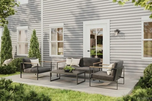 a view of a house with patio and a yard