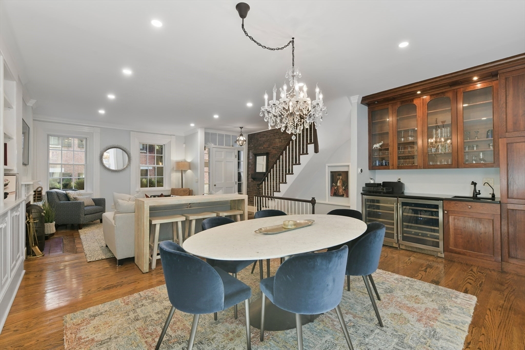 6 Strong Place Boston, MA 02114 - Photo 5 of 25 a large kitchen with a table and chairs