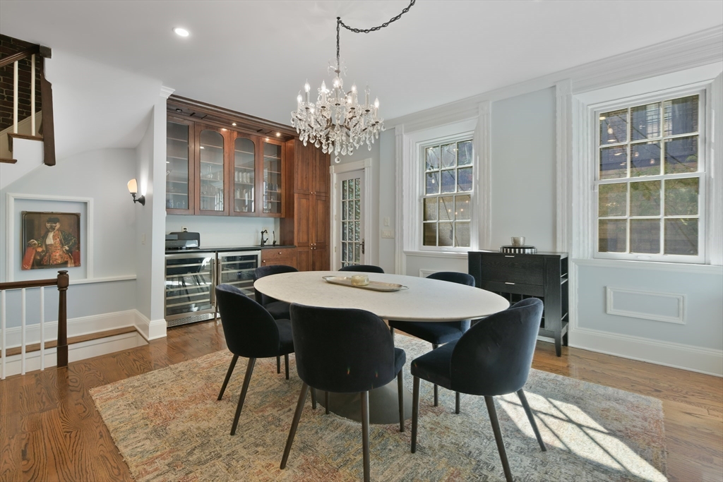 6 Strong Place Boston, MA 02114 - Photo 7 of 25 a view of a dining room with furniture and wooden floor