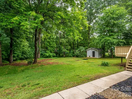 a view of a backyard with a garden