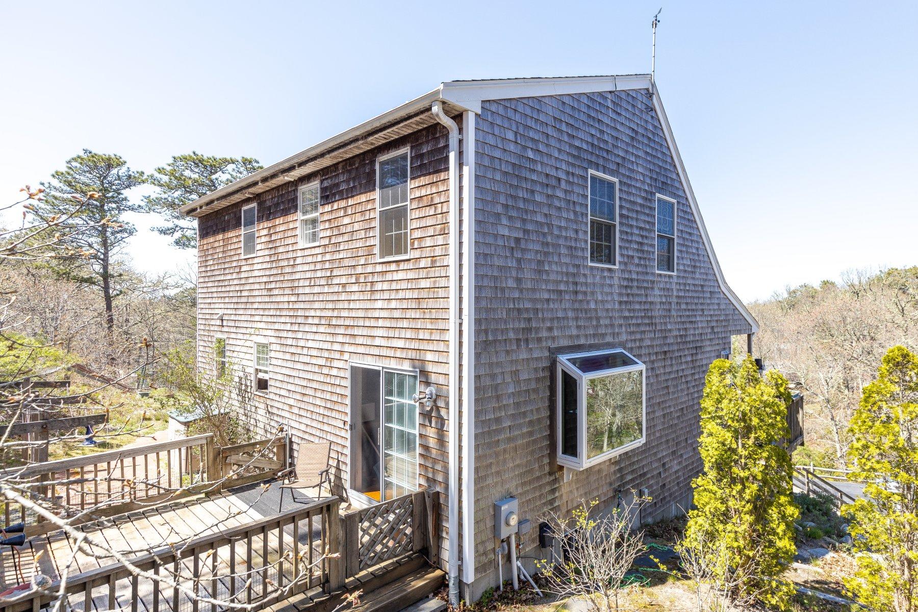 202 Northgate Road North Chatham, MA 02633 - Photo 13 of 34 a front view of a house with a yard