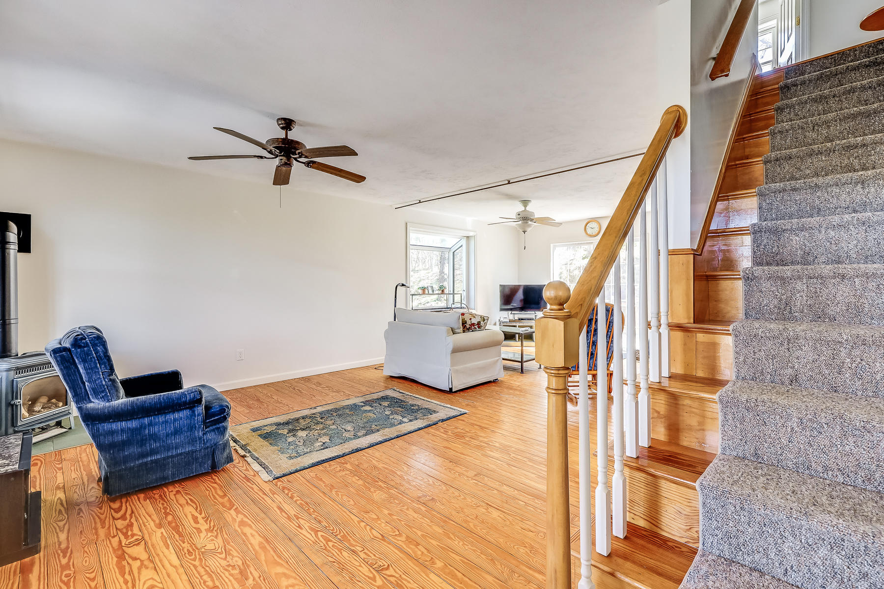 202 Northgate Road North Chatham, MA 02633 - Photo 25 of 34 a living room with furniture and a rug