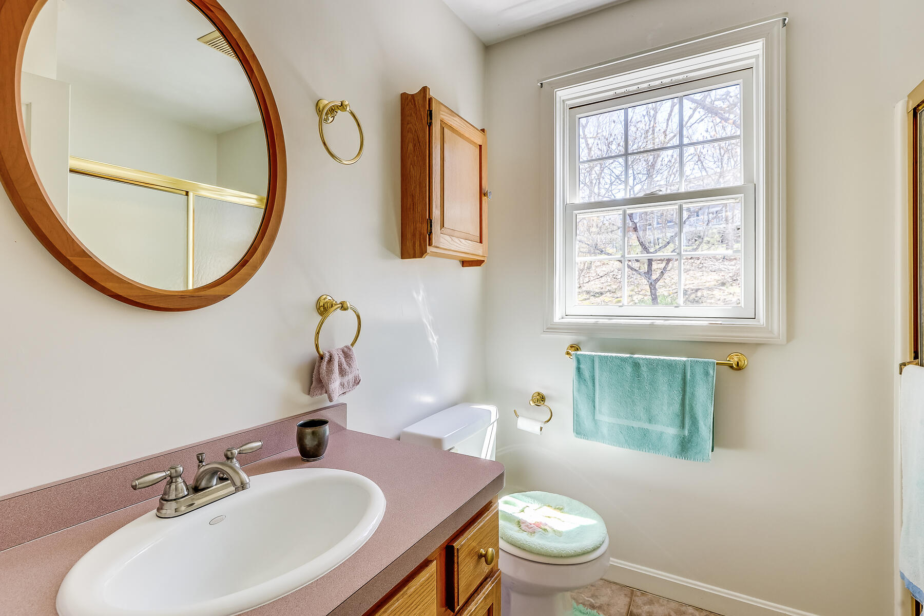 202 Northgate Road North Chatham, MA 02633 - Photo 26 of 34 a bathroom with a sink a mirror and a toilet