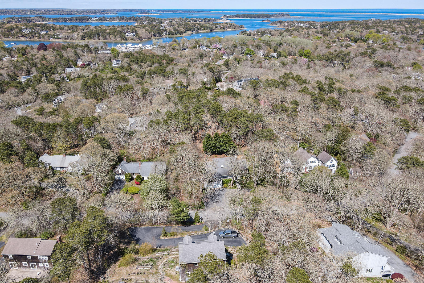 202 Northgate Road North Chatham, MA 02633 - Photo 31 of 34 an aerial view of house with yard and mountain view in back