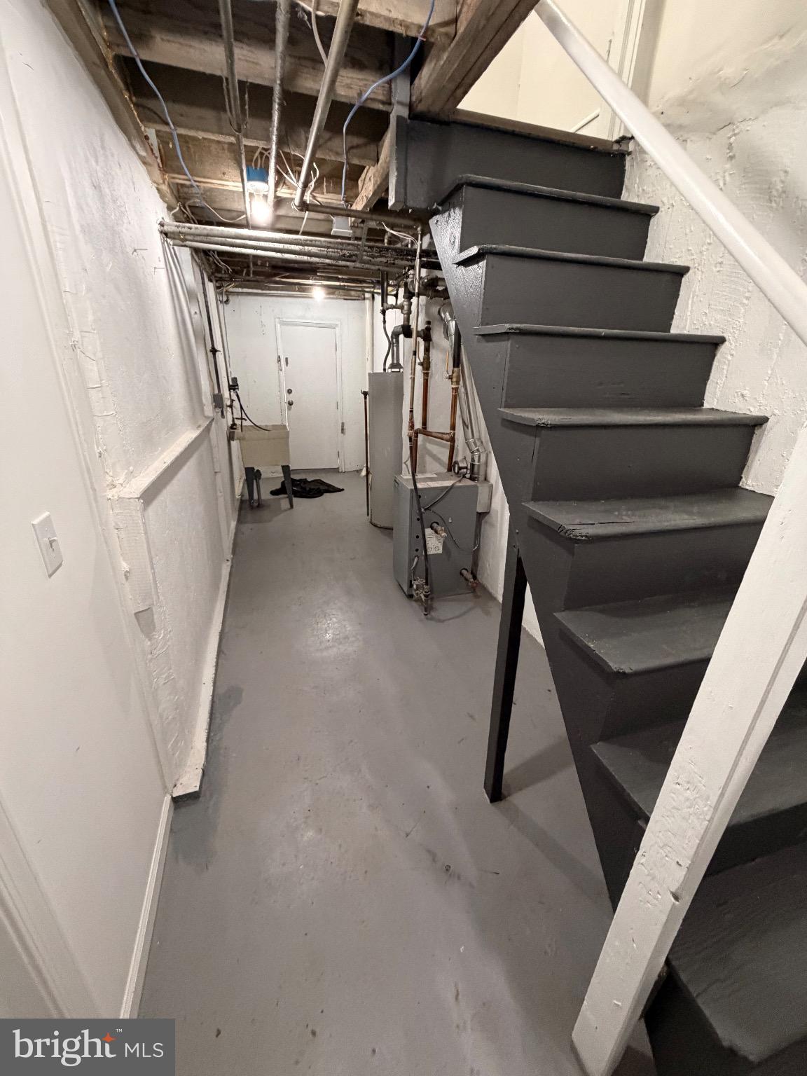 641 Copley Road Upper Darby, PA 19082 - Photo 22 of 29 Spacious basement with modern staircase.