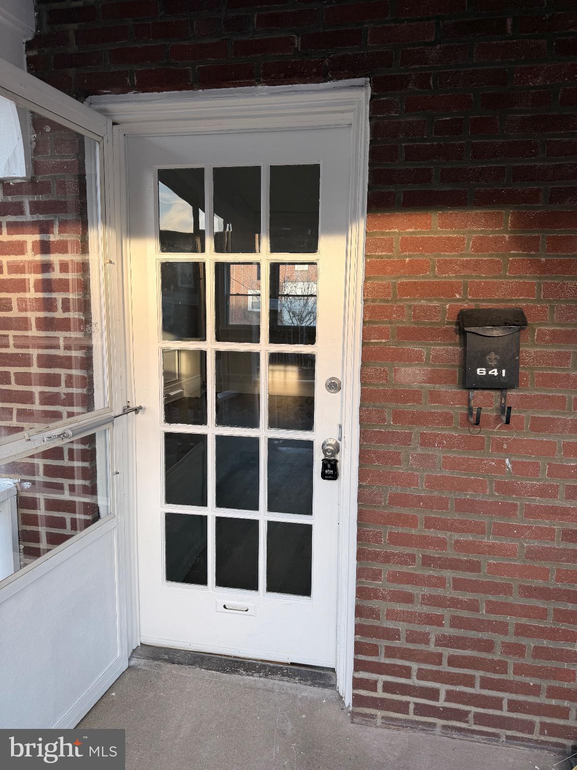641 Copley Road Upper Darby, PA 19082 - Photo 28 of 29 Charming entryway with classic brick facade.