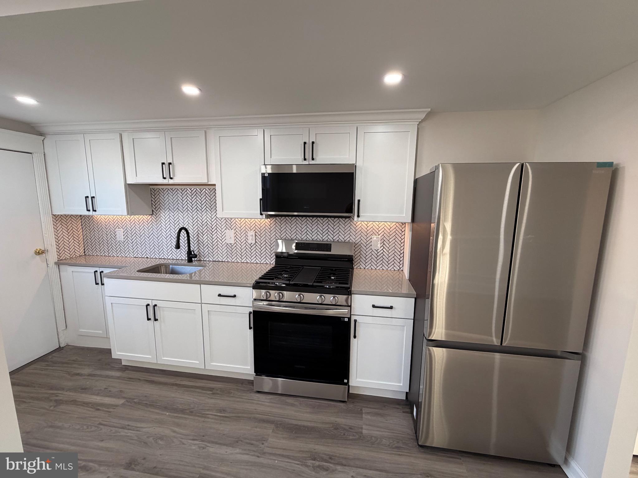 641 Copley Road Upper Darby, PA 19082 - Photo 7 of 29 Modern kitchen with sleek finishes.