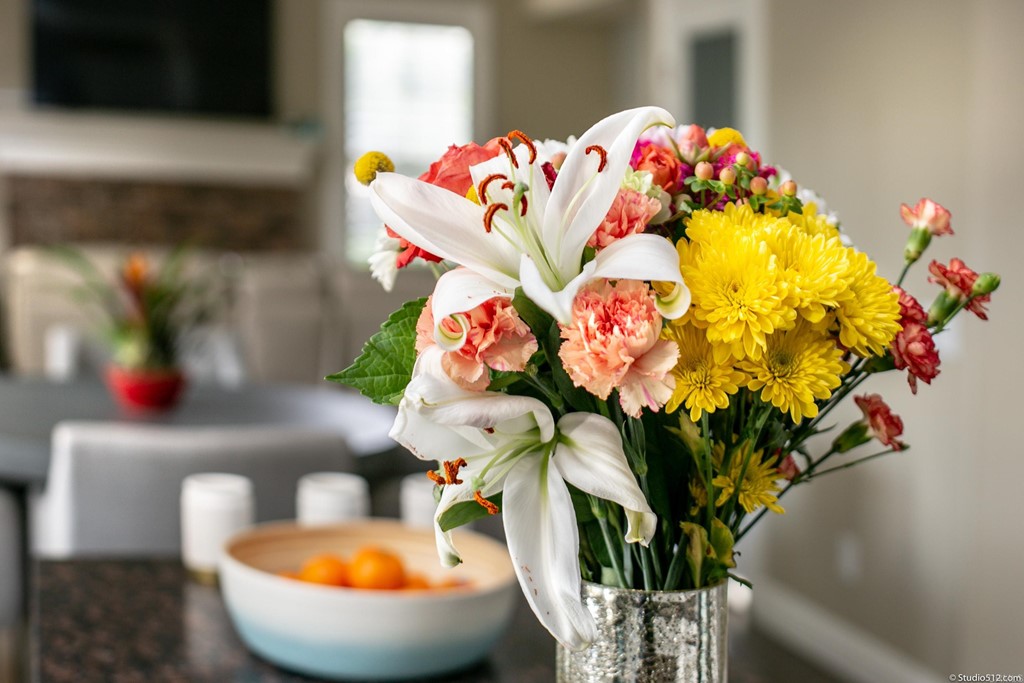 6425 Topmast Drive Carlsbad, CA 92011 - Photo 13 of 32 a vase of flowers sitting on a table