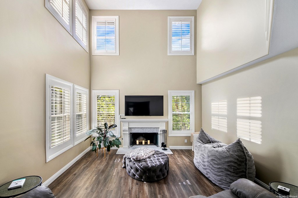 6425 Topmast Drive Carlsbad, CA 92011 - Photo 18 of 32 a living room with furniture fireplace and window