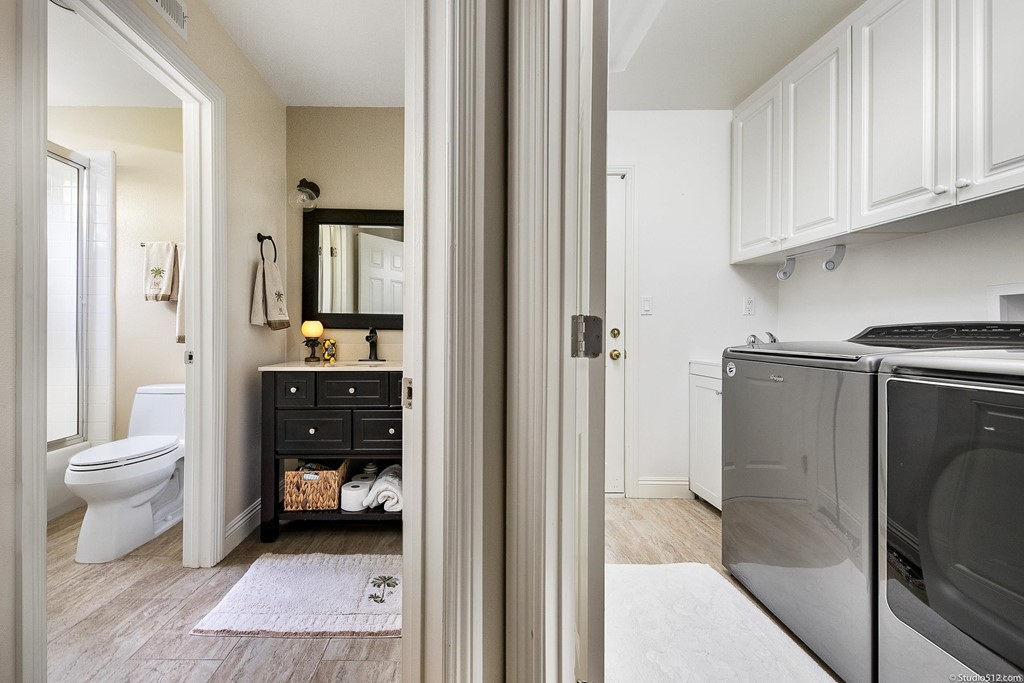 6425 Topmast Drive Carlsbad, CA 92011 - Photo 19 of 32 a en suite bathroom with a toilet a sink and a shower