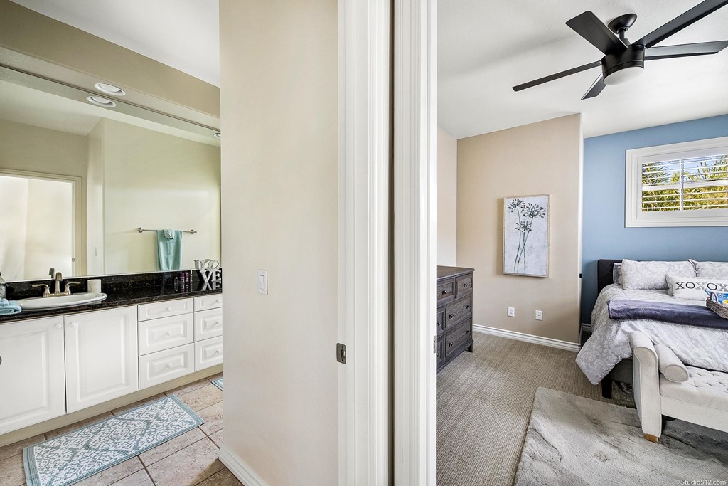 6425 Topmast Drive Carlsbad, CA 92011 - Photo 20 of 32 a spacious bathroom with a sink and a mirror