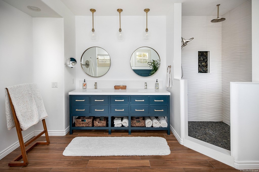 6425 Topmast Drive Carlsbad, CA 92011 - Photo 3 of 32 a living room with wooden floor furniture and a mirror