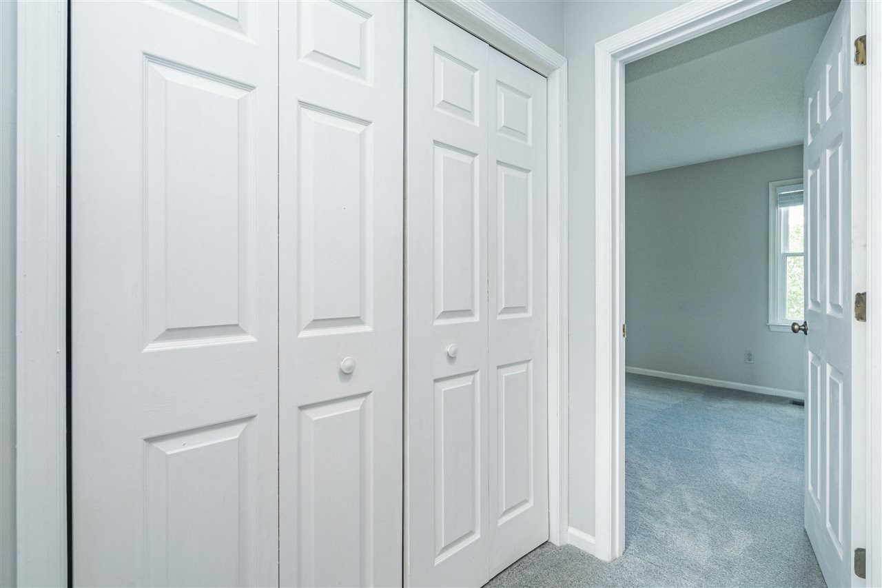 6905 Saxby Court Raleigh, NC 27613 - Photo 17 of 20 Upstairs Laundry Closet