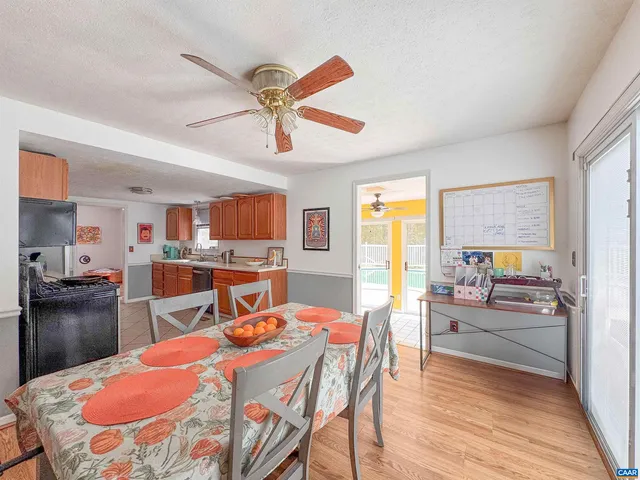 a view of a room with sliding door and balcony