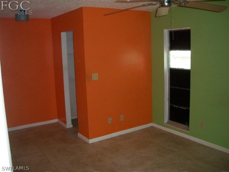 1802 Ridgecrest Street Lehigh Acres, FL 33936 - Photo 4 of 10 a view of an empty room