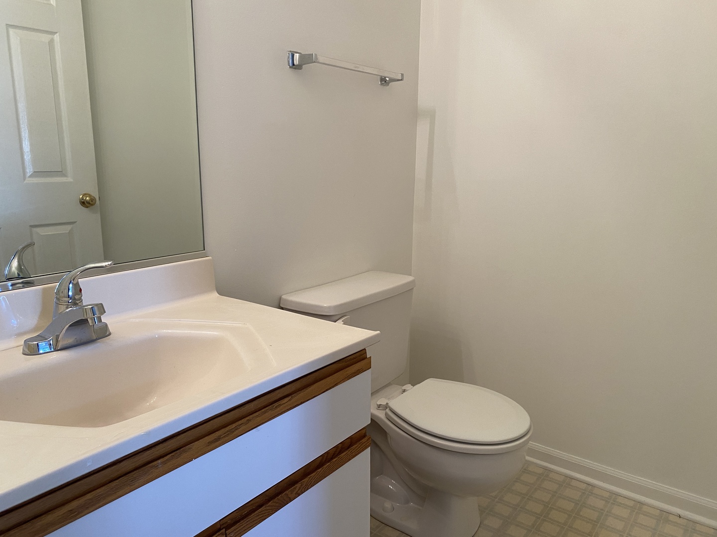 720 Daybreak Lane, Unit 720 Carol Stream, IL 60188 - Photo 11 of 22 a bathroom with a sink a toilet and vanity