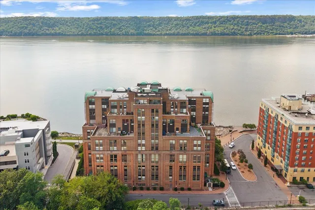 a view of a lake with a city