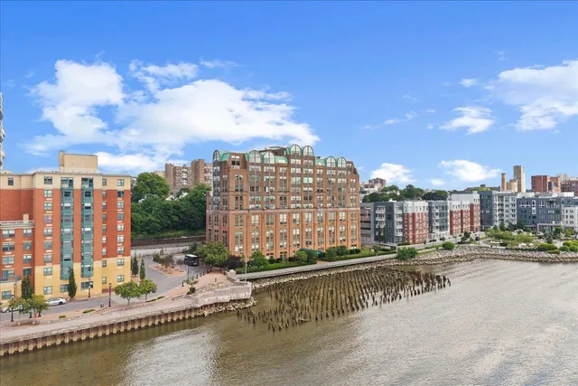 a view of a city with tall buildings