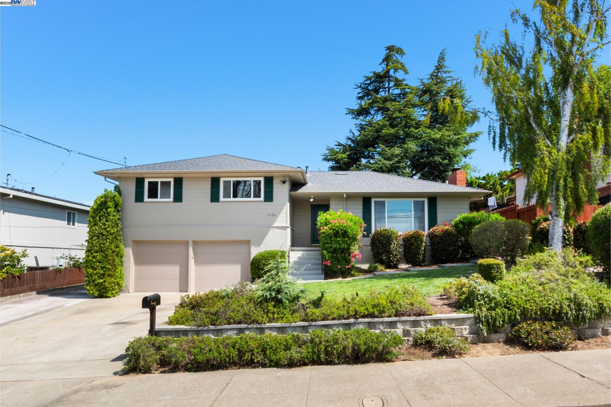 5176 Proctor Road Castro Valley, CA 94546 - Photo 1 of 1 a front view of a house with a yard
