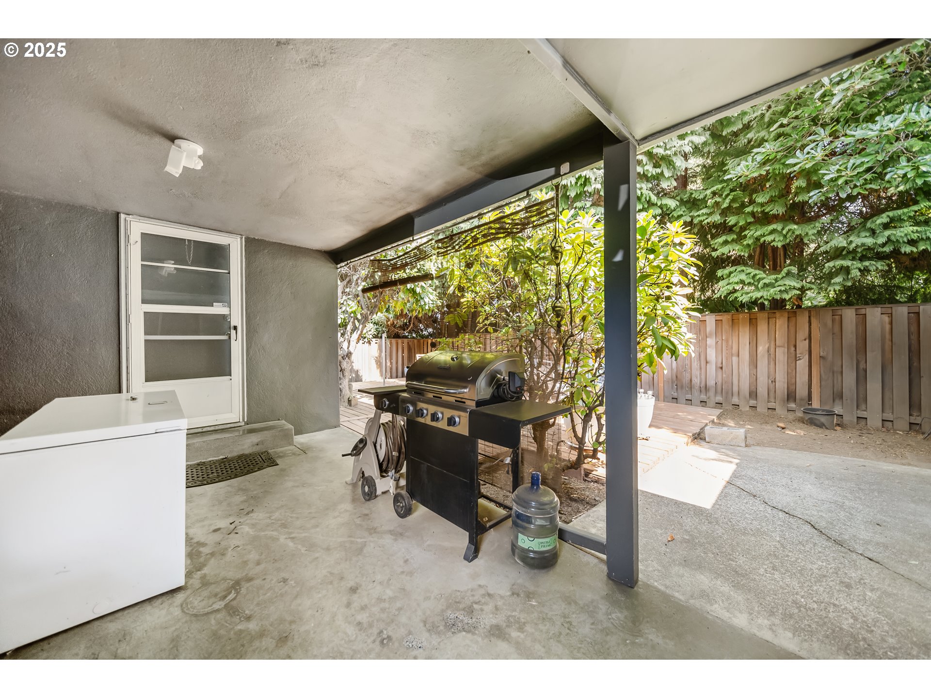 6026 Northeast 57th Avenue Portland, OR 97218 - Photo 38 of 45 a living room with furniture and a large window