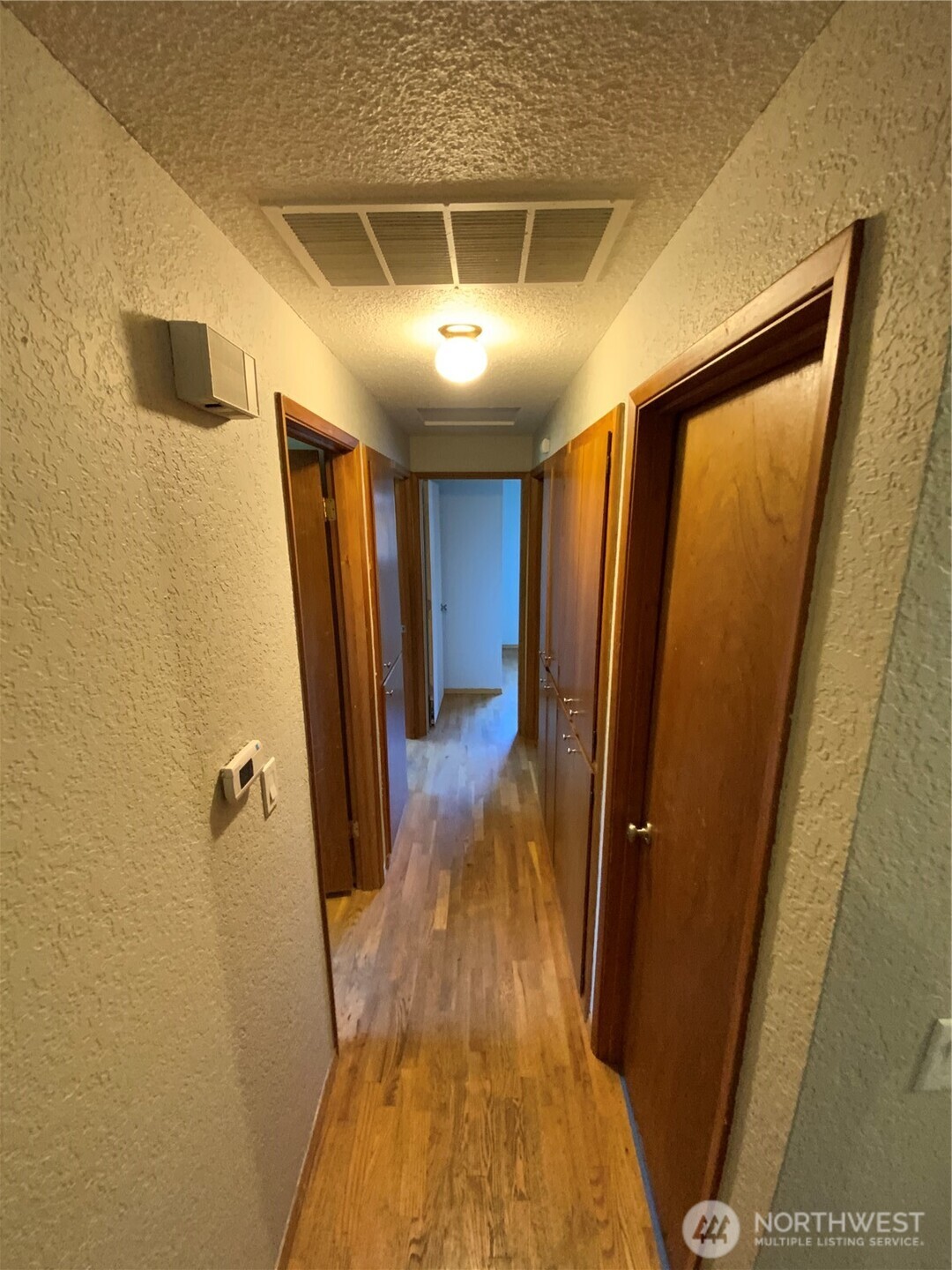 621 Brookdale Road East Tacoma, WA 98445 - Photo 8 of 14 a view of a hallway
