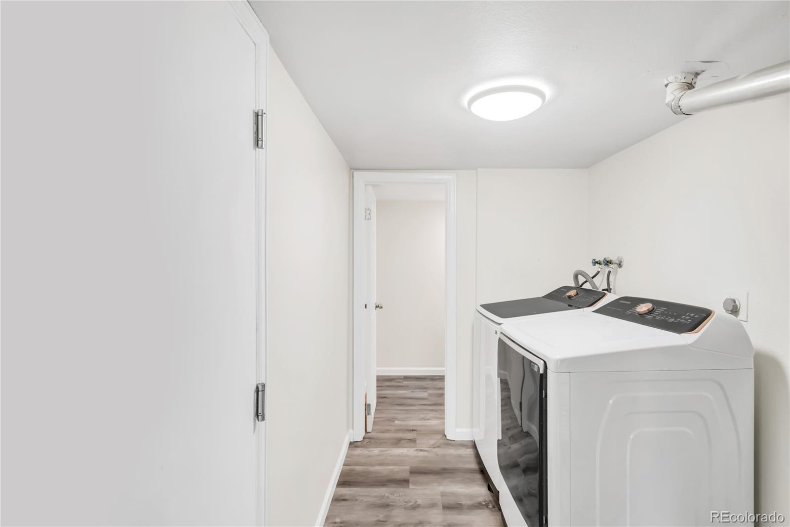 9215 Lowell Boulevard Westminster, CO 80031 - Photo 14 of 30 a utility room with dryer and washer