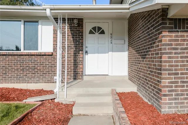 a front view of a house with a garage