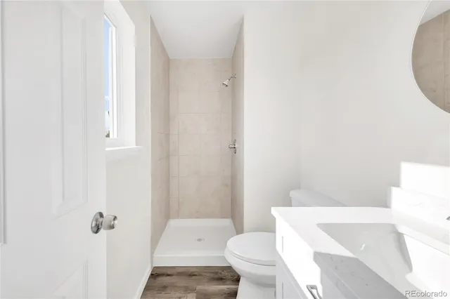 a bathroom with a sink and toilet