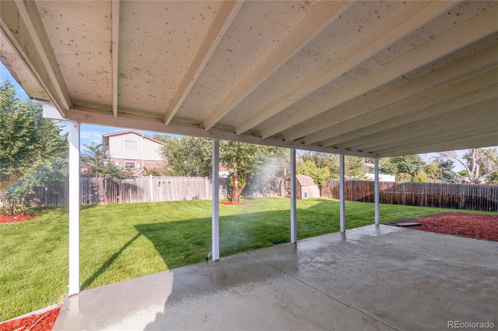 9215 Lowell Boulevard Westminster, CO 80031 - Photo 28 of 30 a view of a backyard with porch