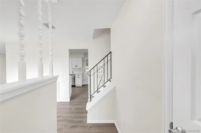a view of entryway with wooden floor