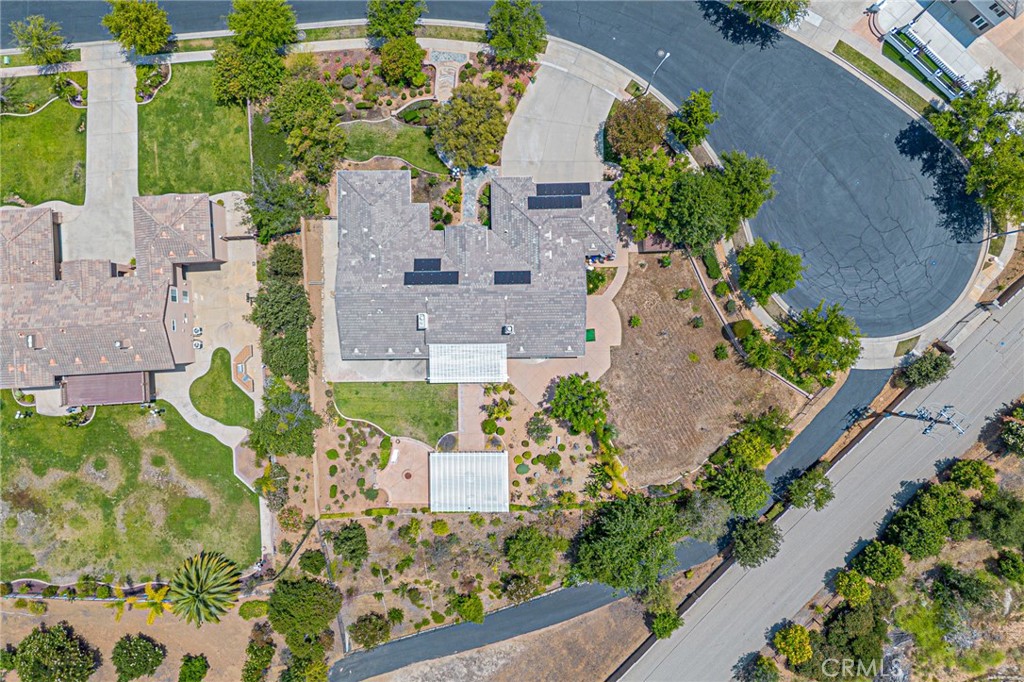 4088 Shady Ridge Circle Corona, CA 92881 - Photo 46 of 47 an aerial view of a house with a yard and garden