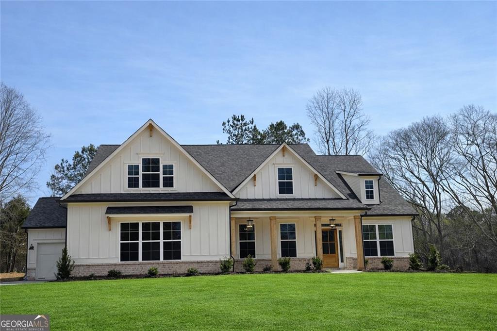 1210 Austin Road Winder, GA 30680 - Photo 1 of 56 front view of a house with a yard