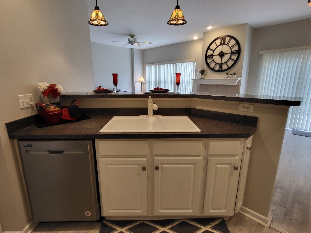 2949 Brossman Street Naperville, IL 60564 - Photo 17 of 61 a kitchen with a sink cabinets and a table
