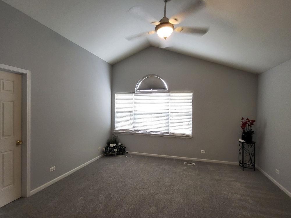 2949 Brossman Street Naperville, IL 60564 - Photo 27 of 61 a view of a room with a ceiling fan and window