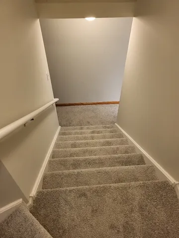 a view of a back yard of the house