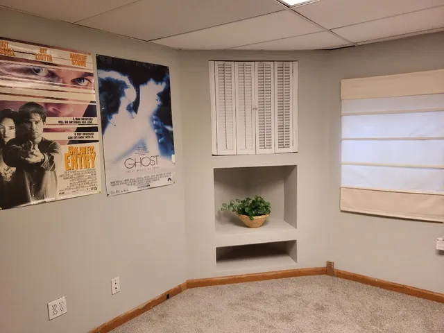 a view of house with backyard