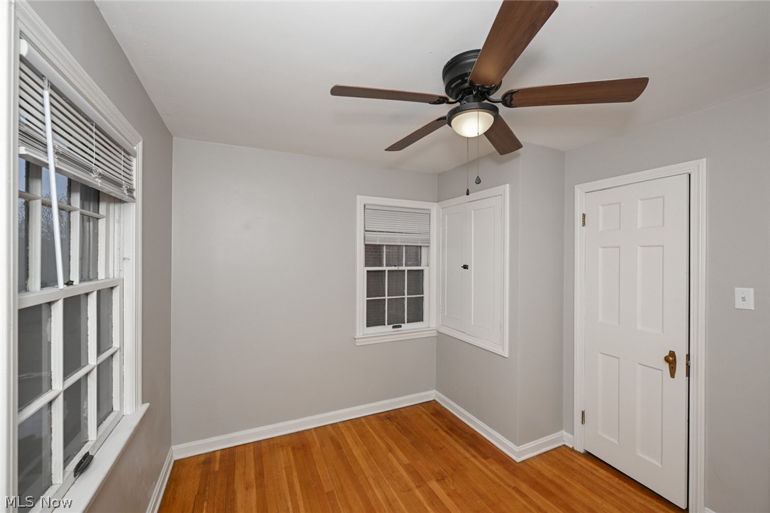 3699 Bainbridge Road Cleveland Heights, OH 44118 - Photo 25 of 37 Room featuring wood-finish flooring and a neutral wall color