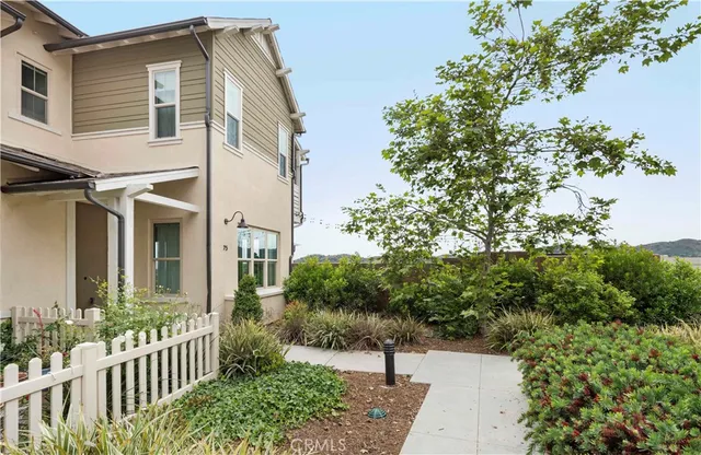 an aerial view of a city with lots of residential buildings