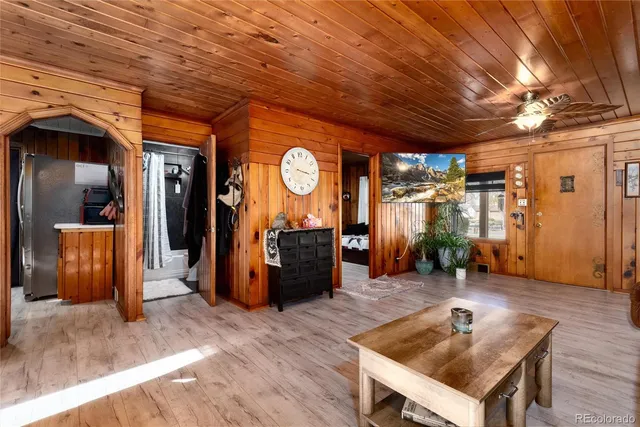 a room with furniture and wooden floor