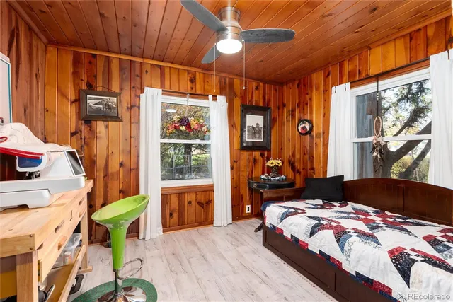 a bathroom with a shower and a sink
