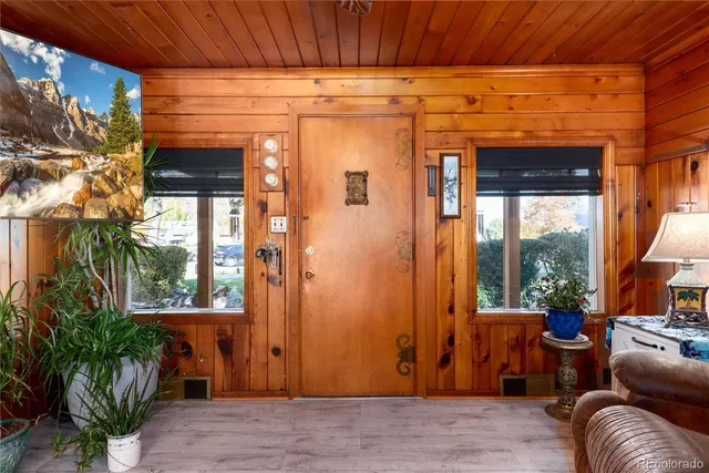 an aerial view of residential building and trees