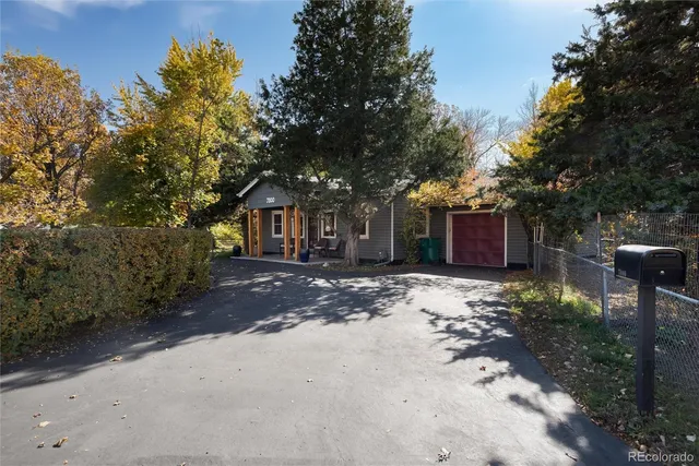 a backyard of a house with seating space